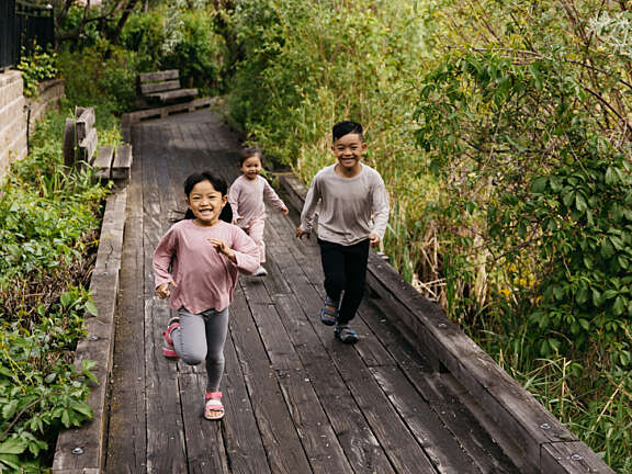 Kids Running on the Boardwalk at Summerland Waterfront Resort & Spa