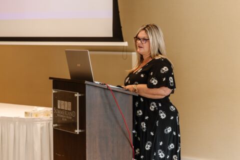 SWR ball room Susie Helland speaking credit stephanie lucile photography min